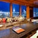 The panels behind a granite bar show a mural designed to create a convincing cityscape view